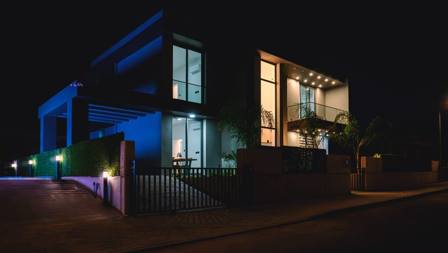 Villa facade lit at night