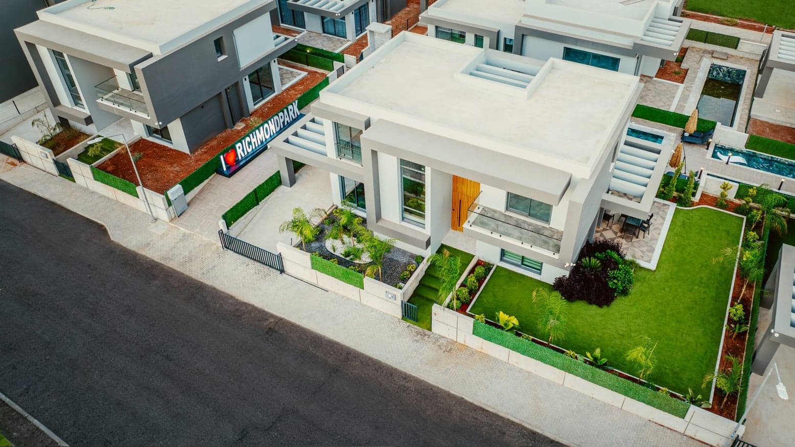 Drone view of a Richmond Park villa garden and roof terrace