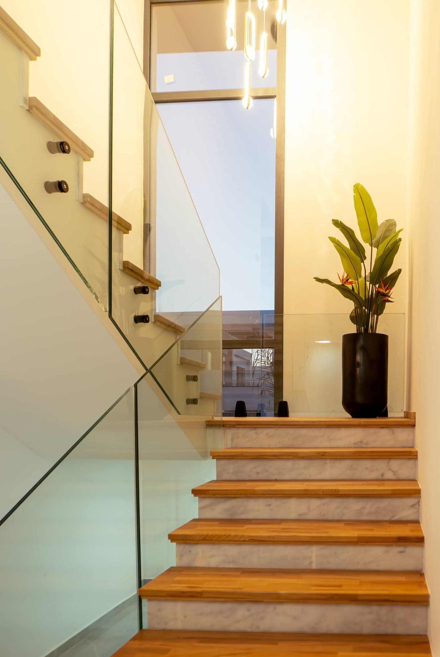 Oak stair with glass balustrade